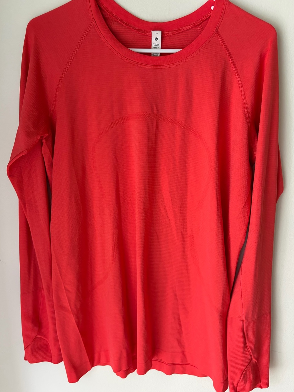 40. Size 14 LULULEMON Red-Orange Longsleeve Swiftly